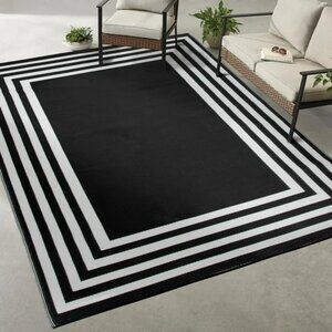 7'x10' Modern Black Pastic Rug